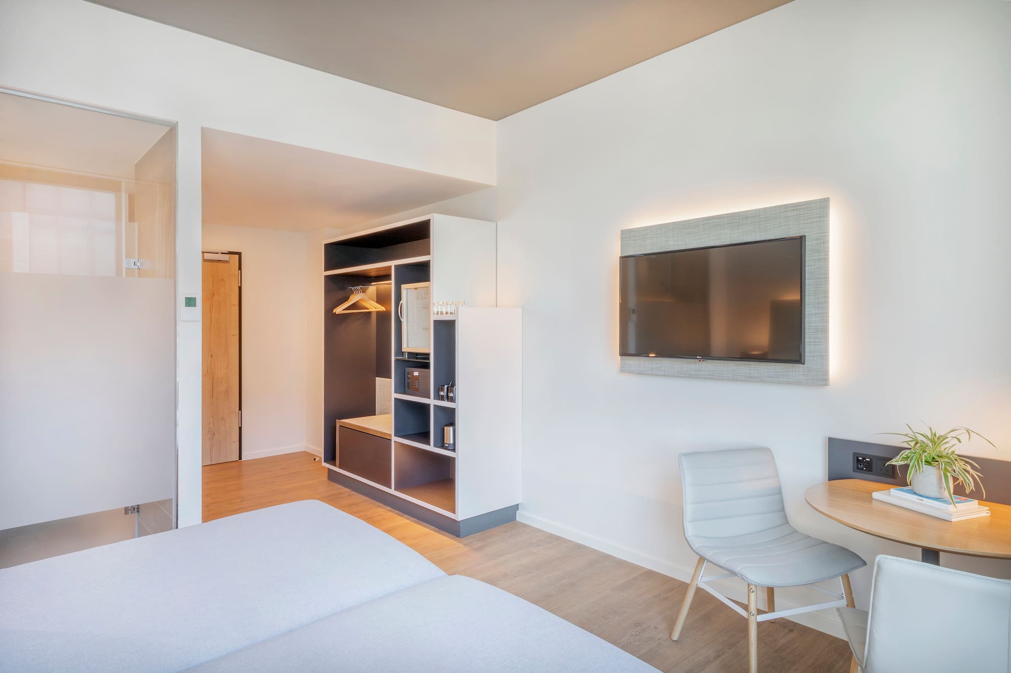 a room with a tv and a table