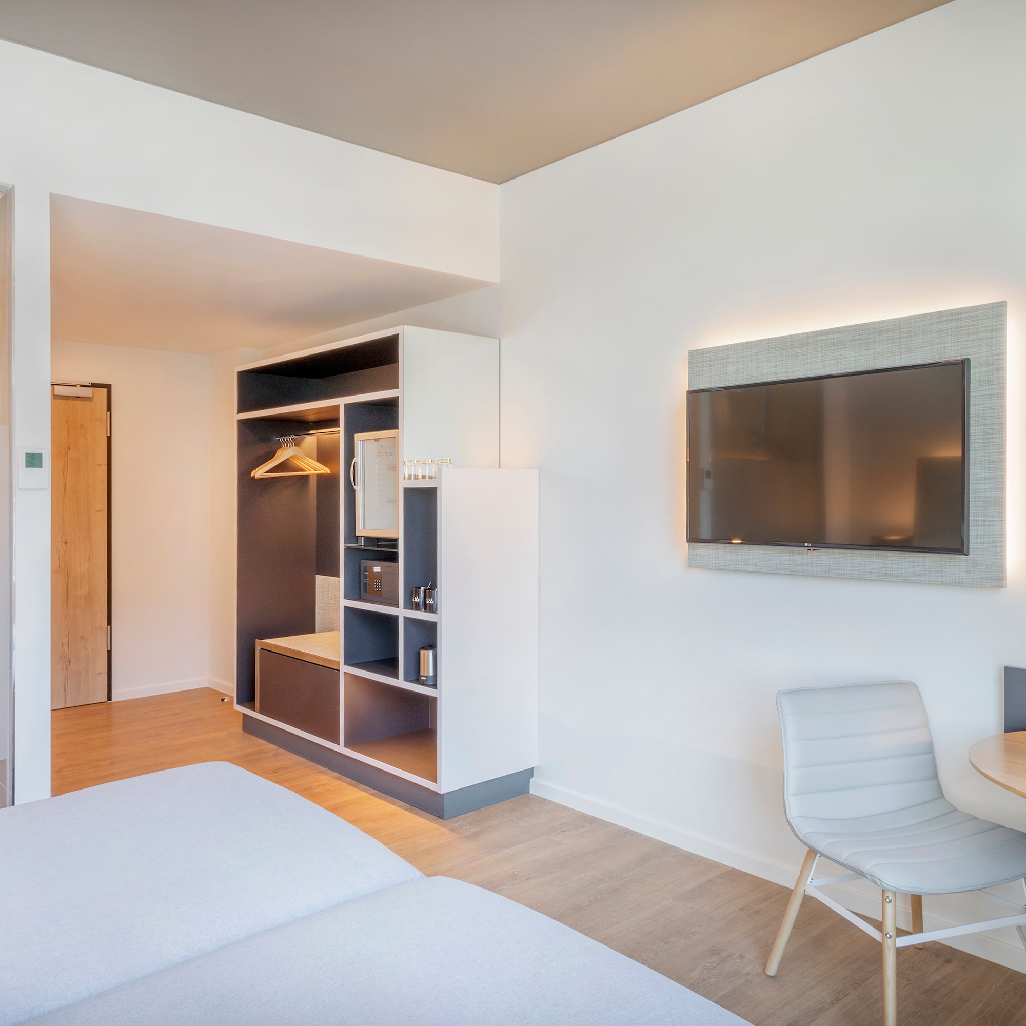 a room with a tv and a table