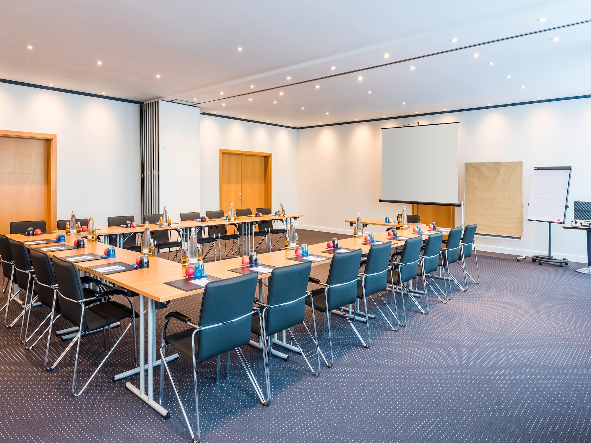 a room with tables and chairs