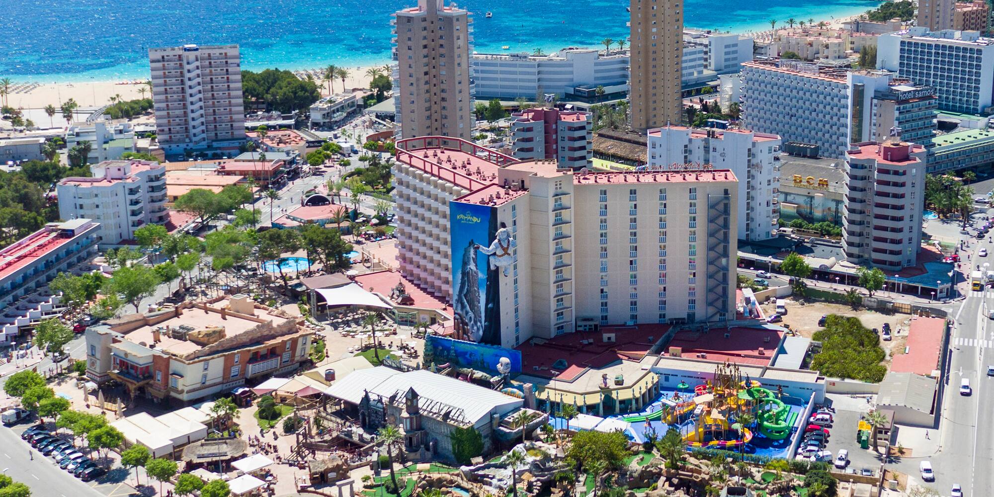 a city with buildings and a beach