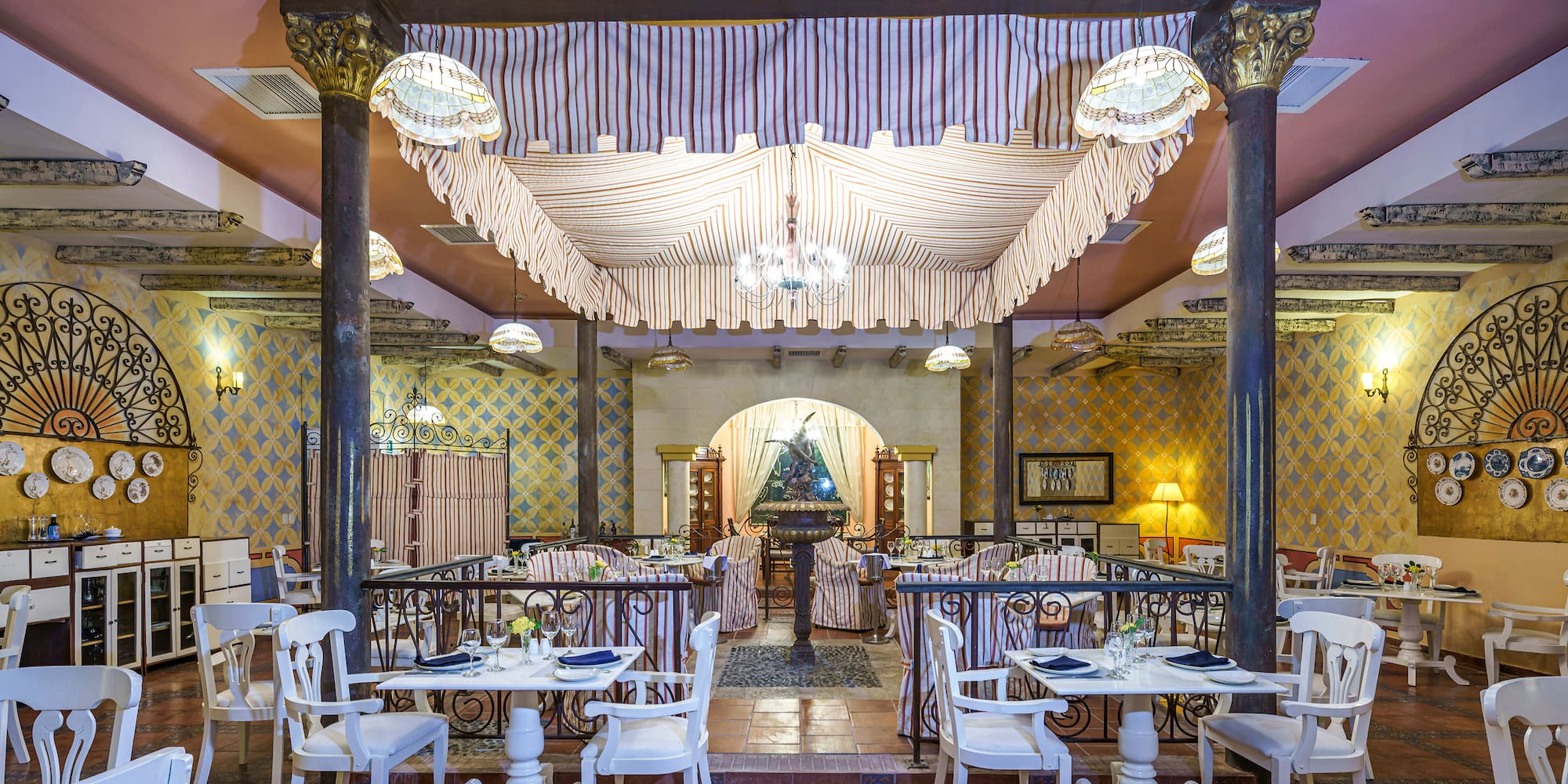 a restaurant with tables and chairs