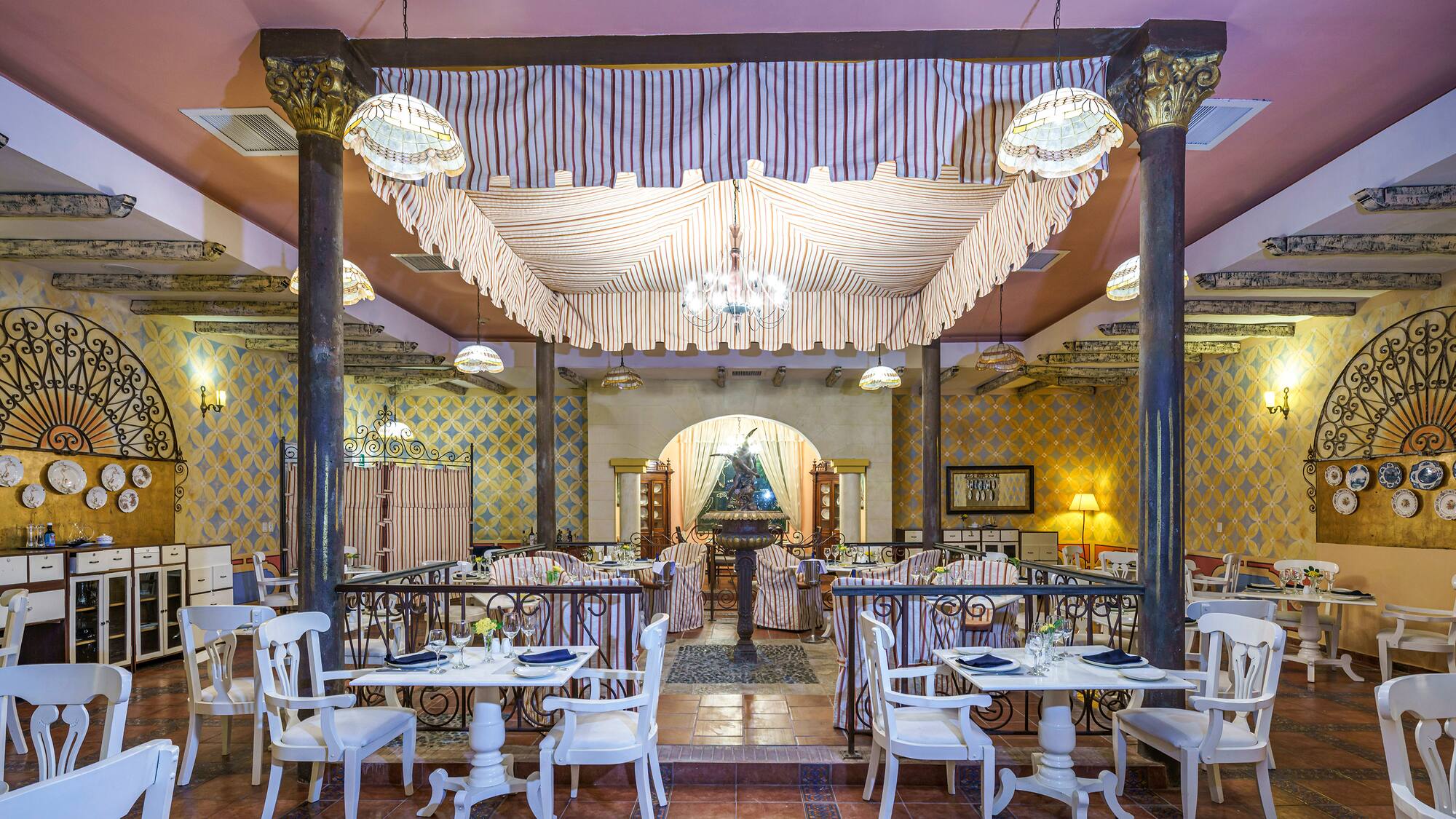 a restaurant with tables and chairs