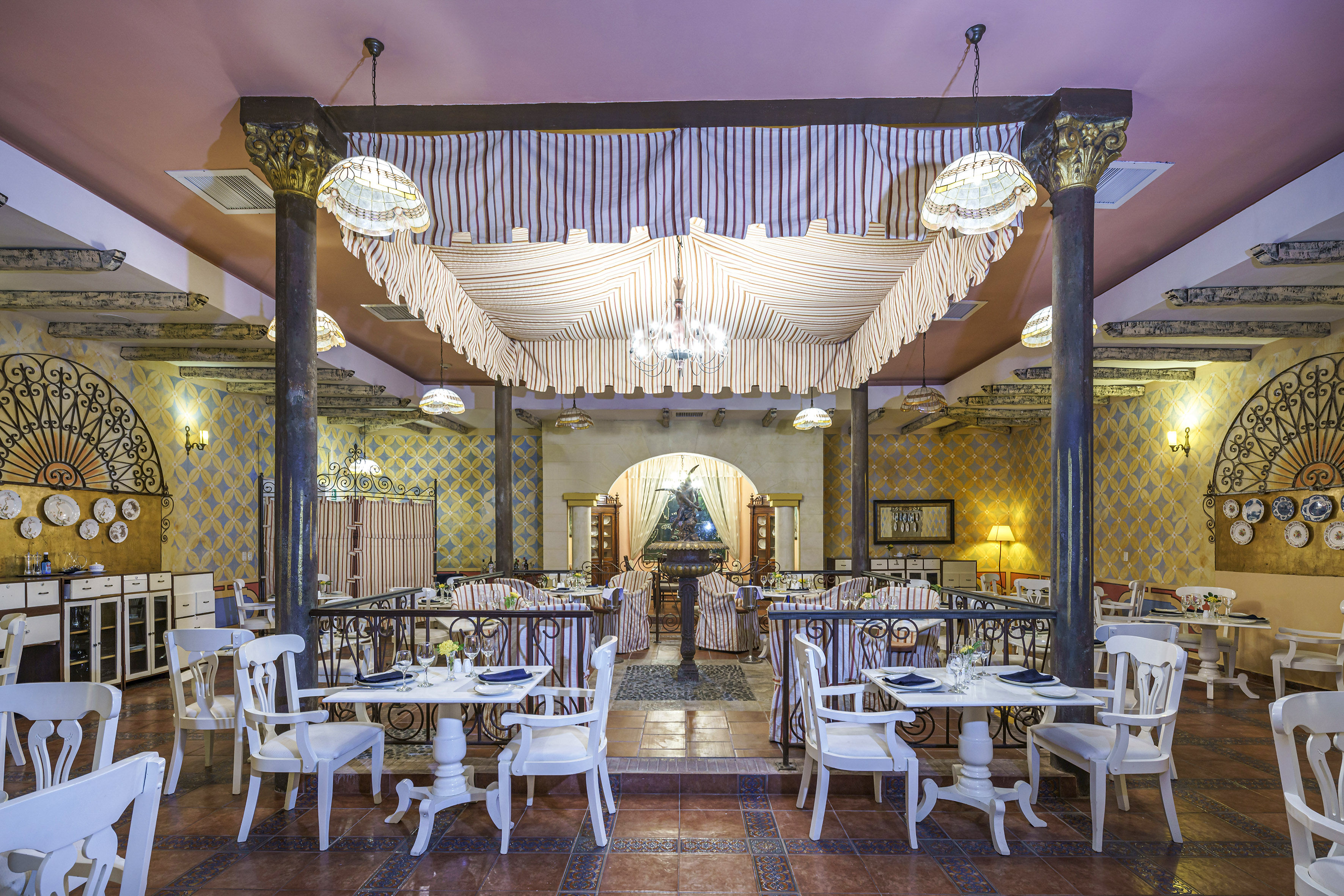 a restaurant with tables and chairs