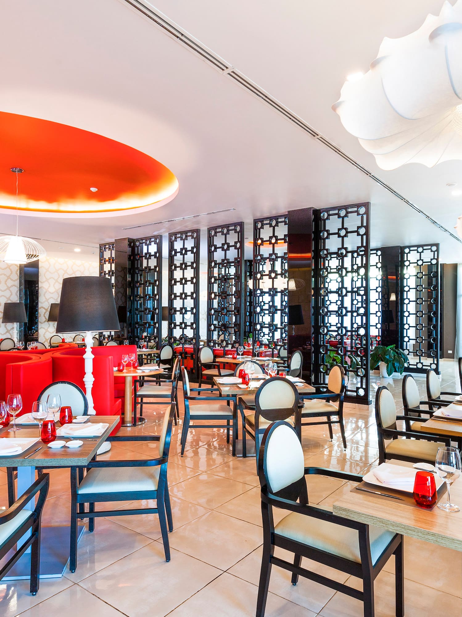 a restaurant with tables and chairs