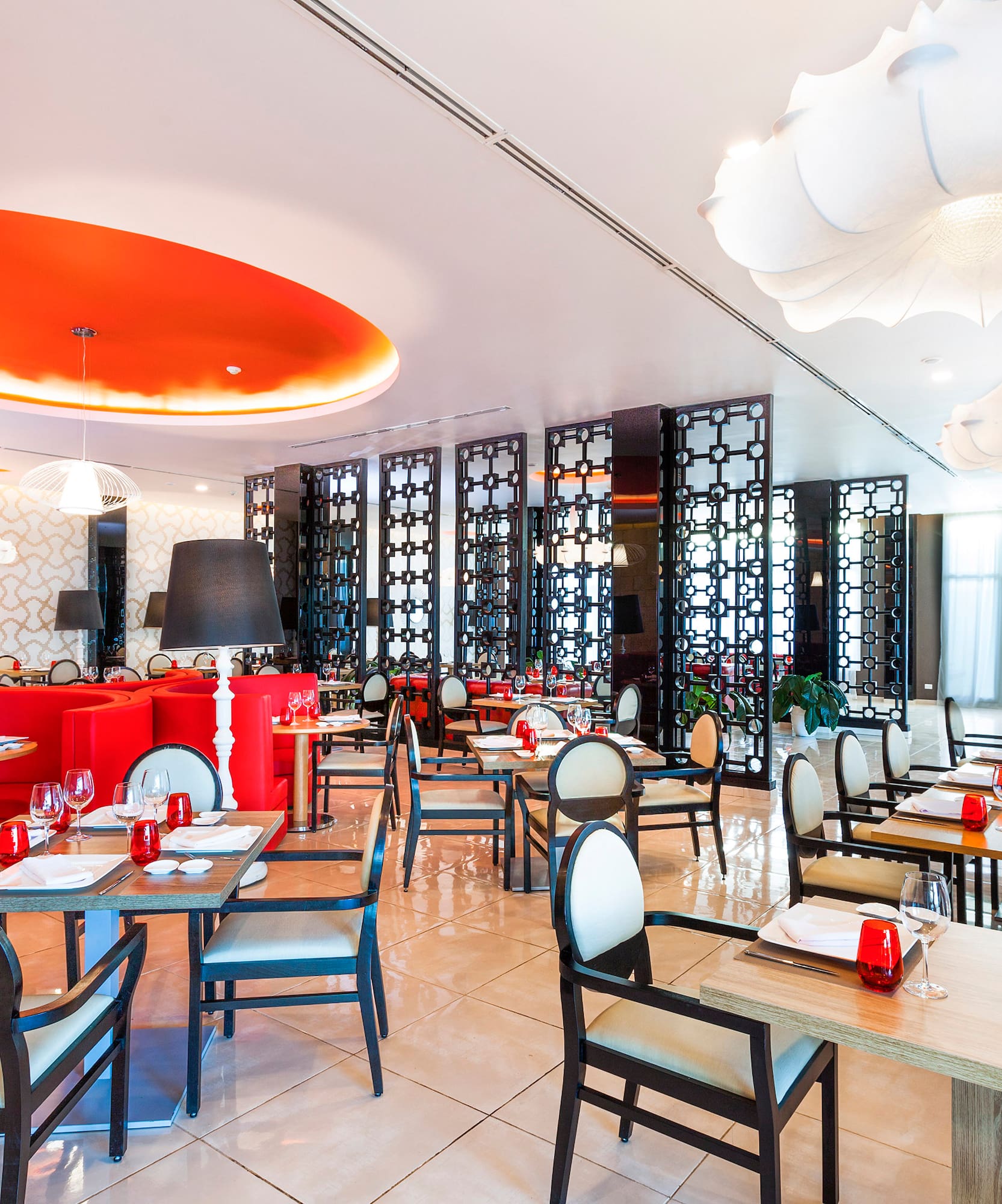 a restaurant with tables and chairs