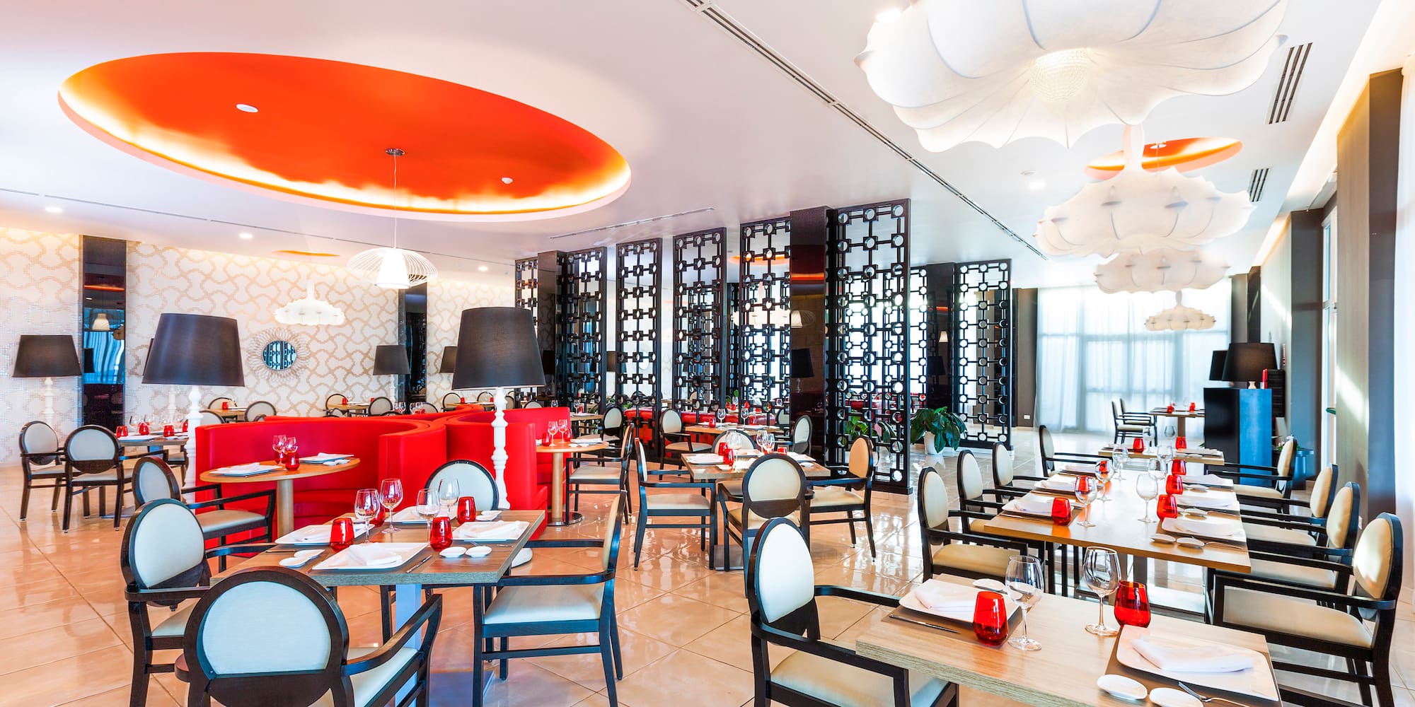 a restaurant with tables and chairs