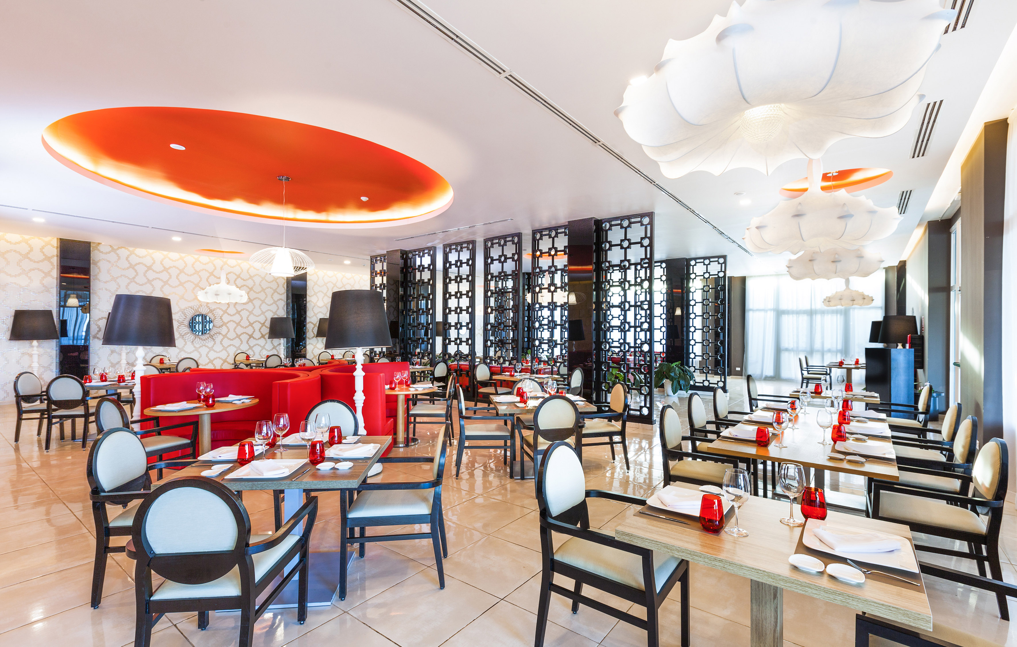 a restaurant with tables and chairs