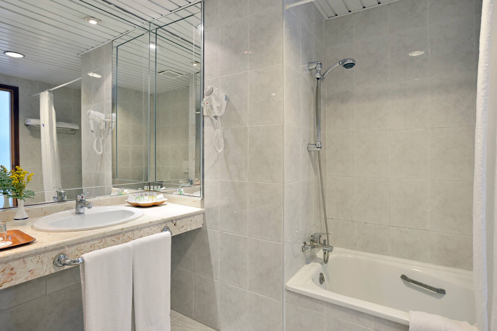 a bathroom with a sink and a bathtub