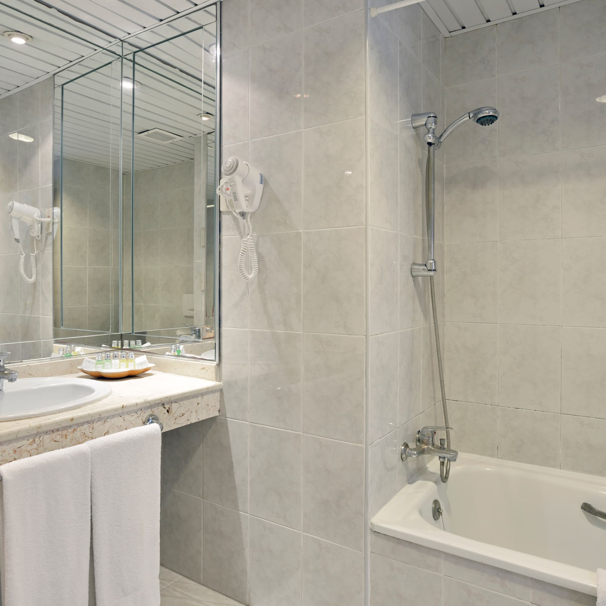 a bathroom with a sink and a bathtub