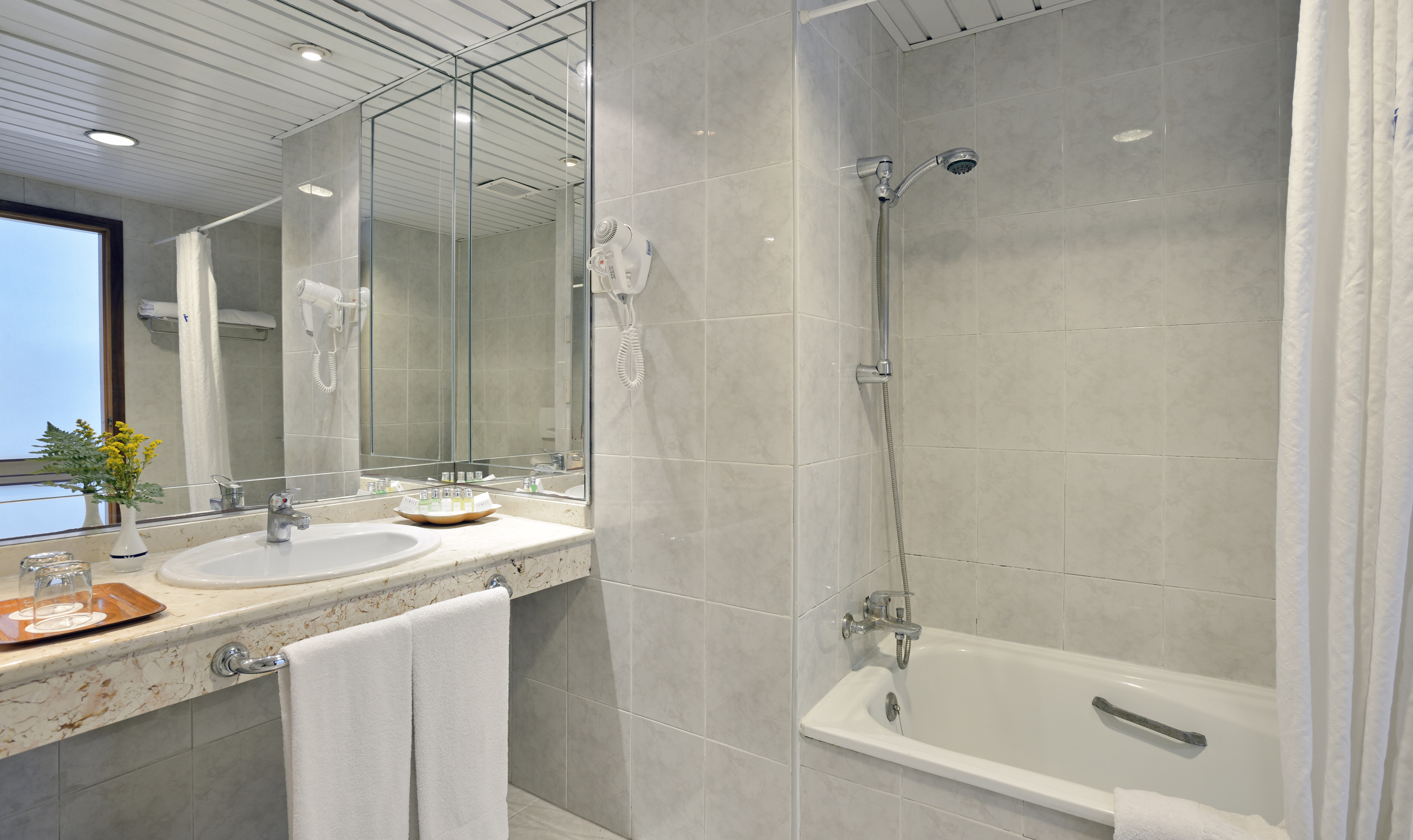 a bathroom with a sink and a bathtub
