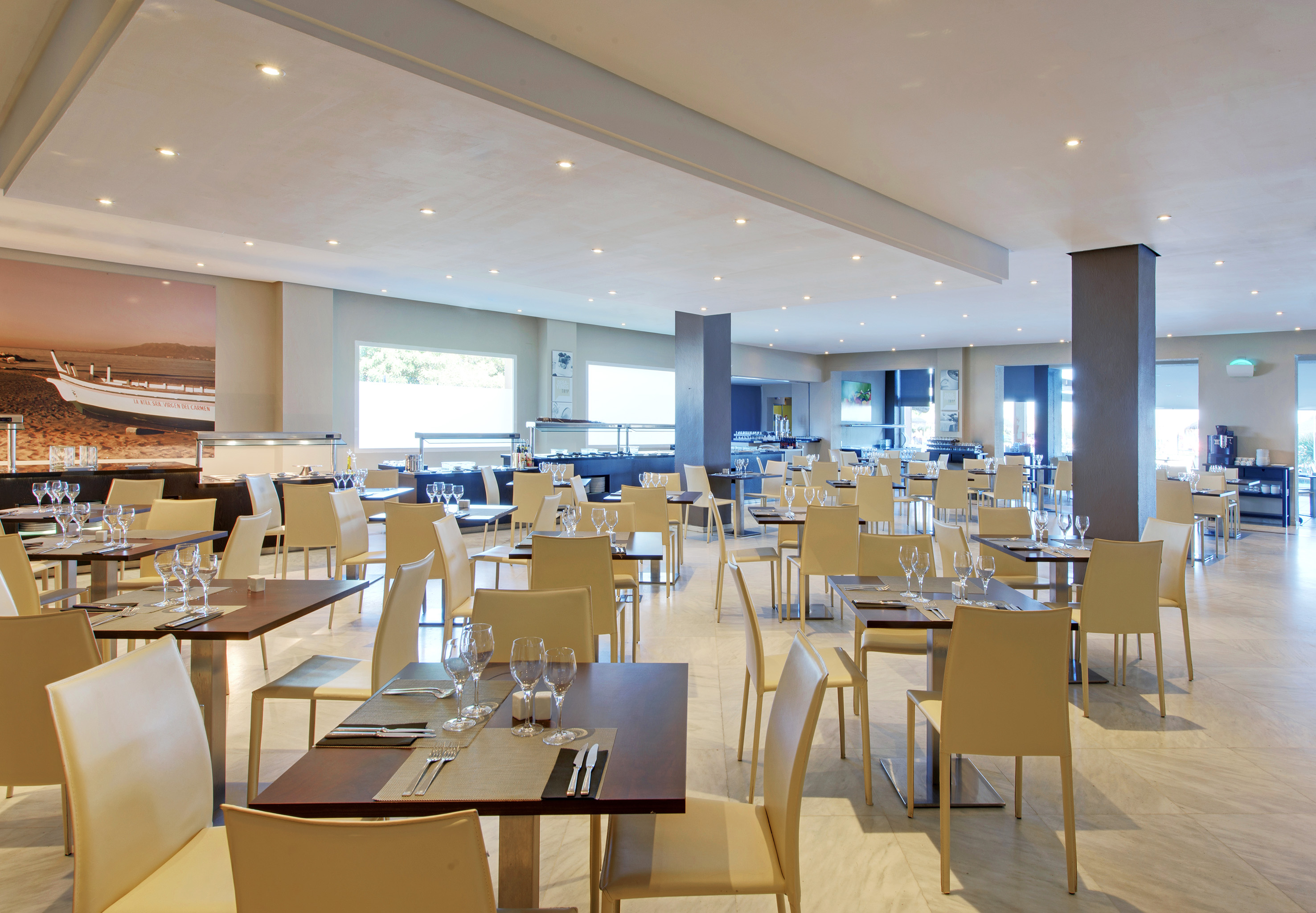a restaurant with tables and chairs