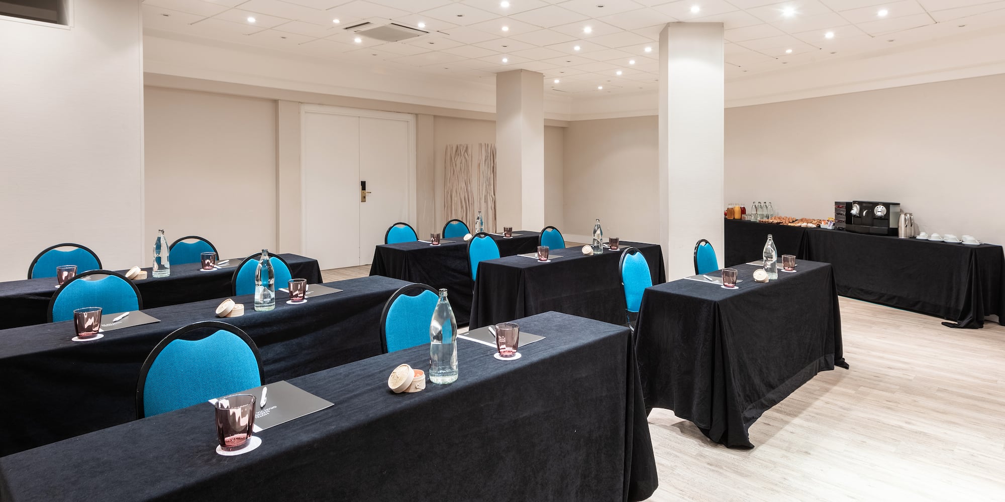 a room with tables and chairs