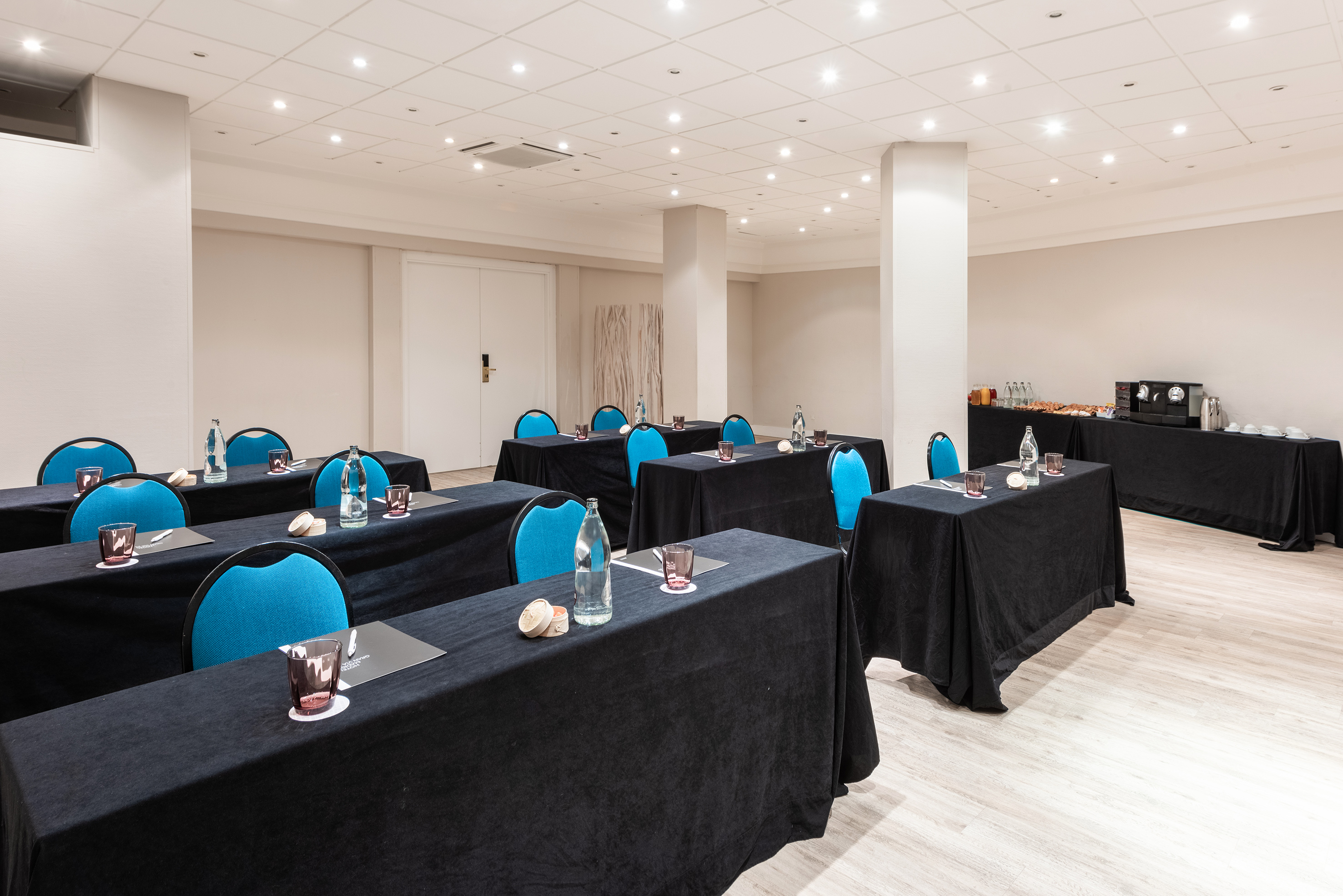 a room with tables and chairs