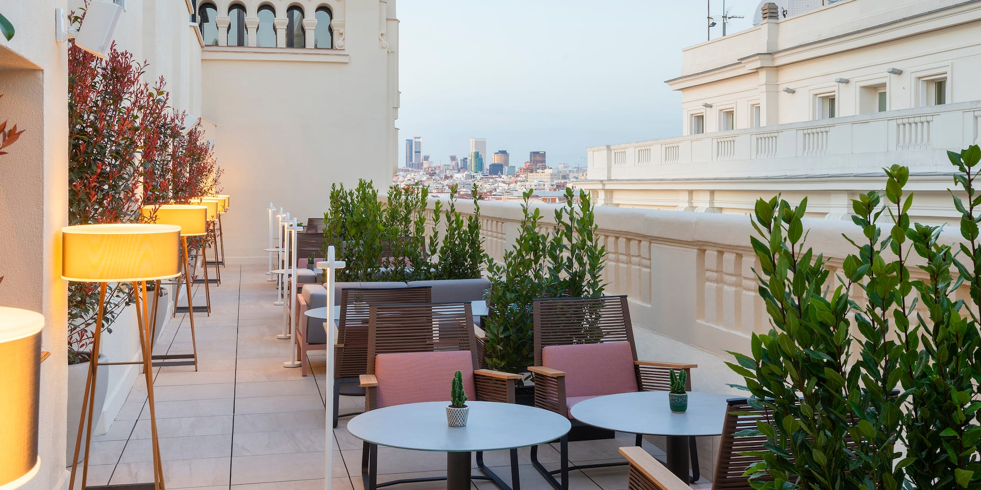 a patio with tables and chairs