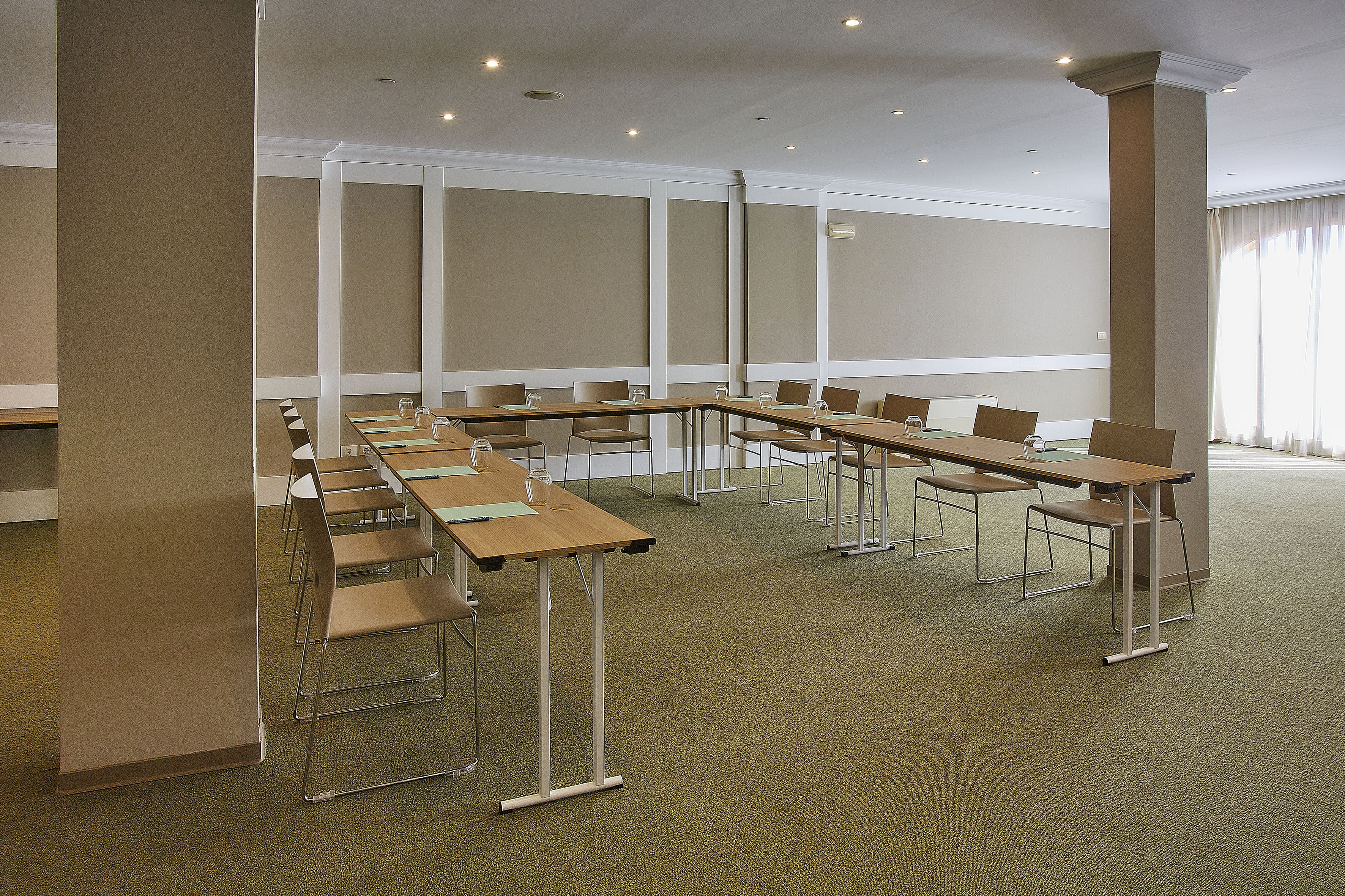 a room with tables and chairs