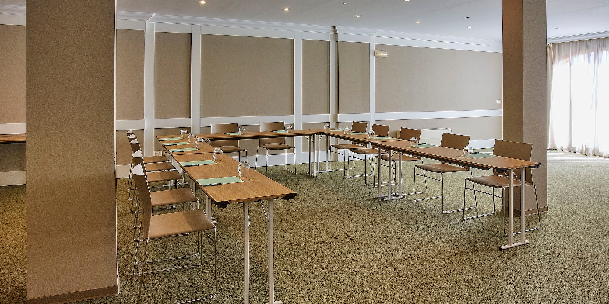 a room with tables and chairs