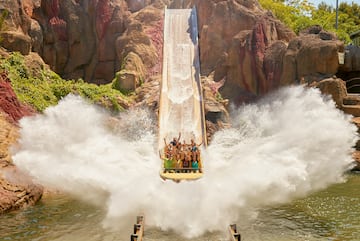 a group of people on a water slide