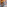 Modern lounge with wingback chairs, geometric wood and fabric panel wall.
