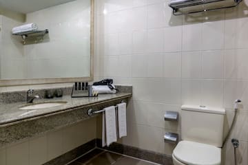 a bathroom with a sink and toilet