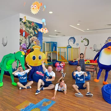 a group of people posing for a photo