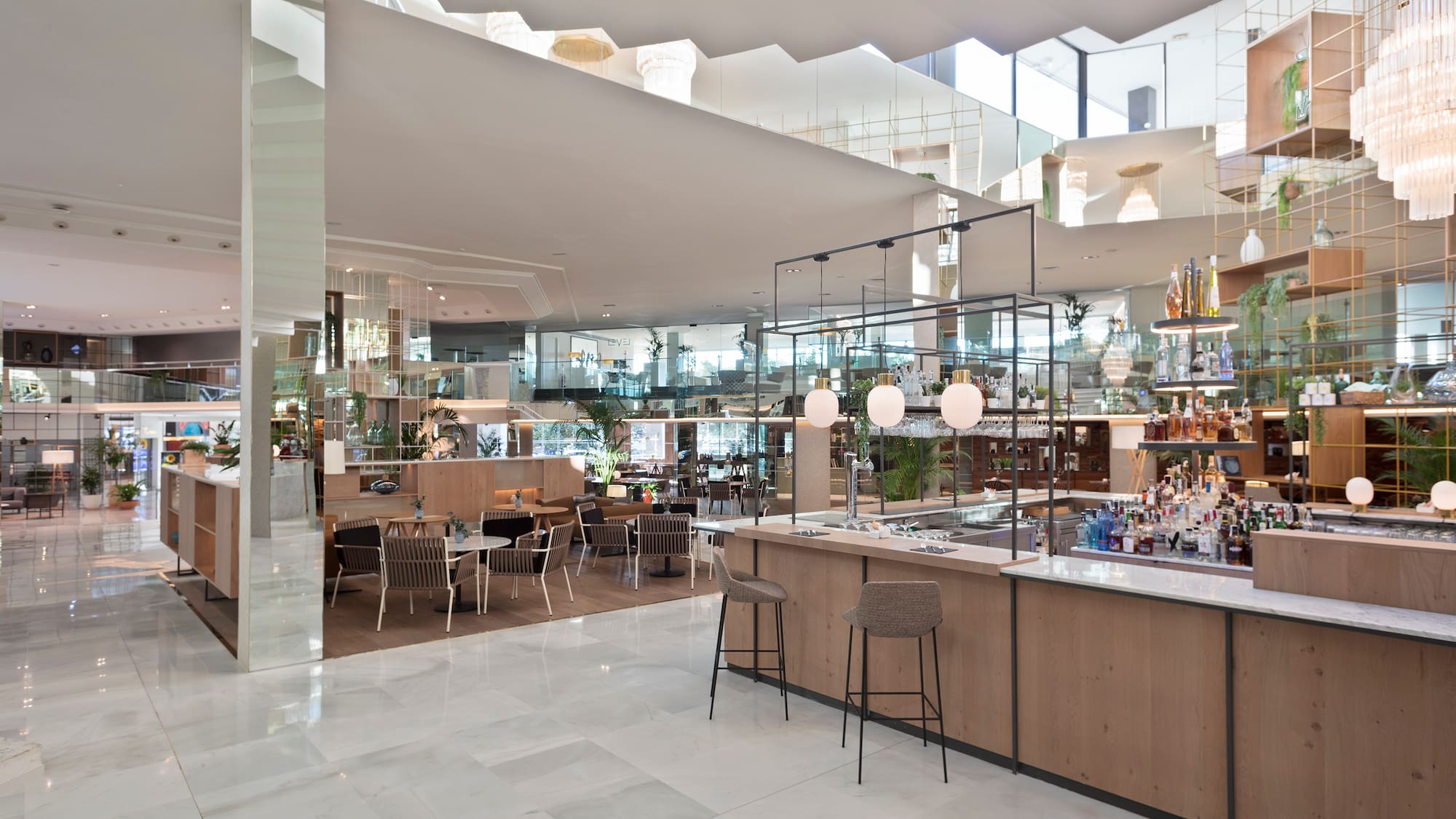 a restaurant with a bar and chairs