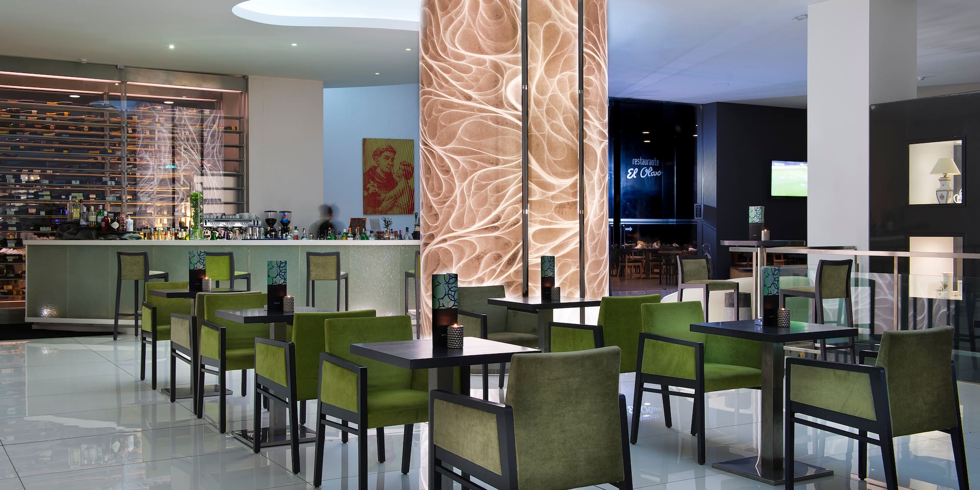 a restaurant with tables and chairs