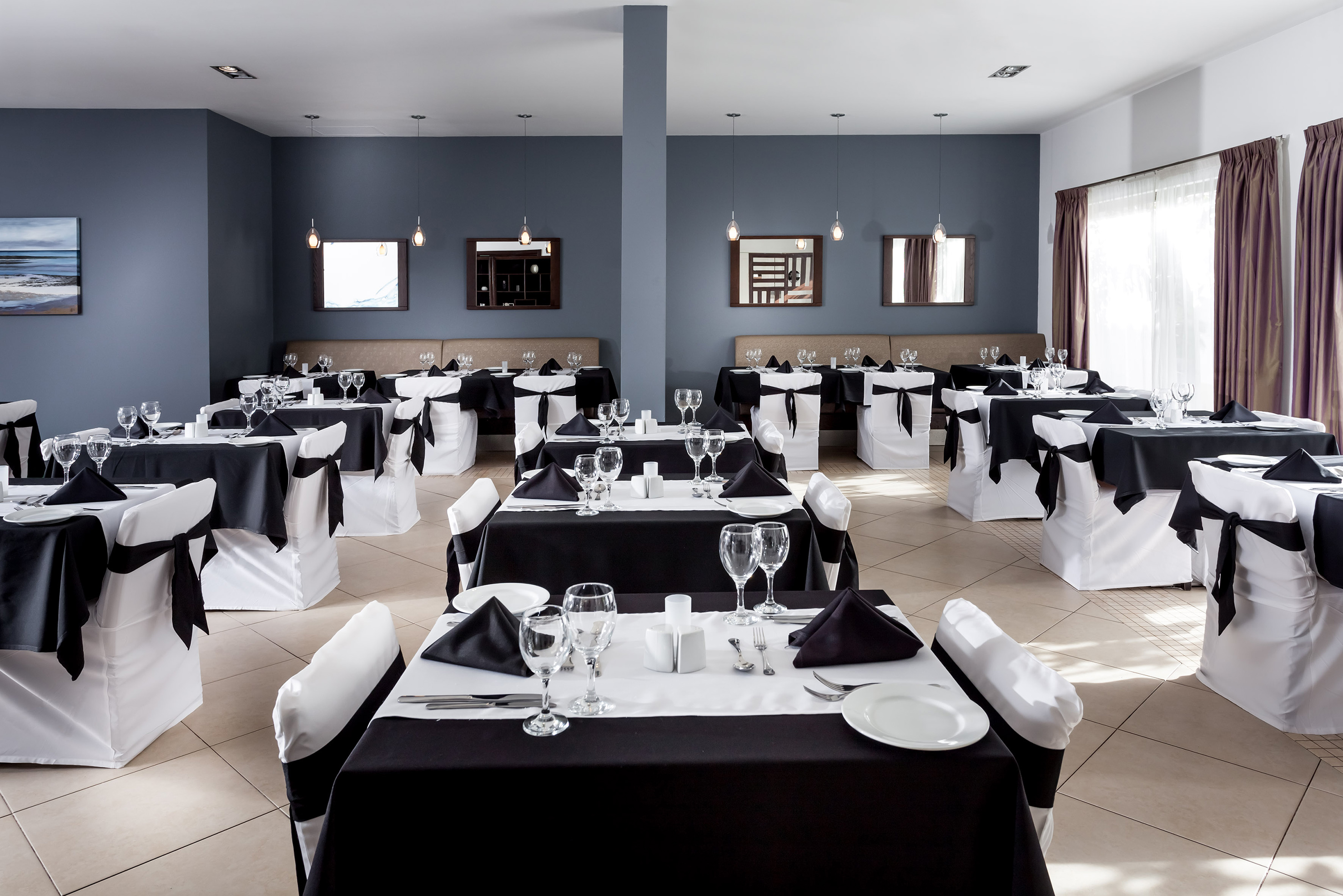 a room with tables and chairs