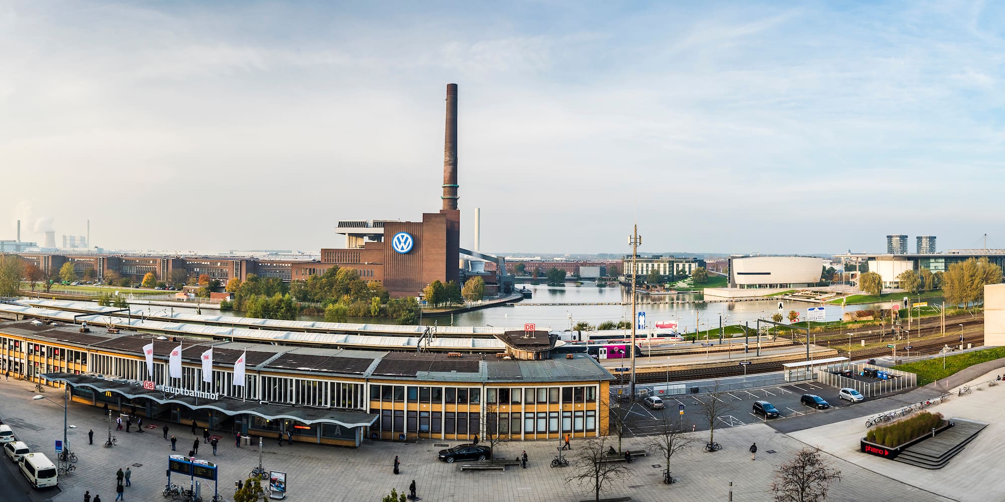 Wolfsburg panorama: Volkswagen factory, Autostadt, and Hauptbahnhof.