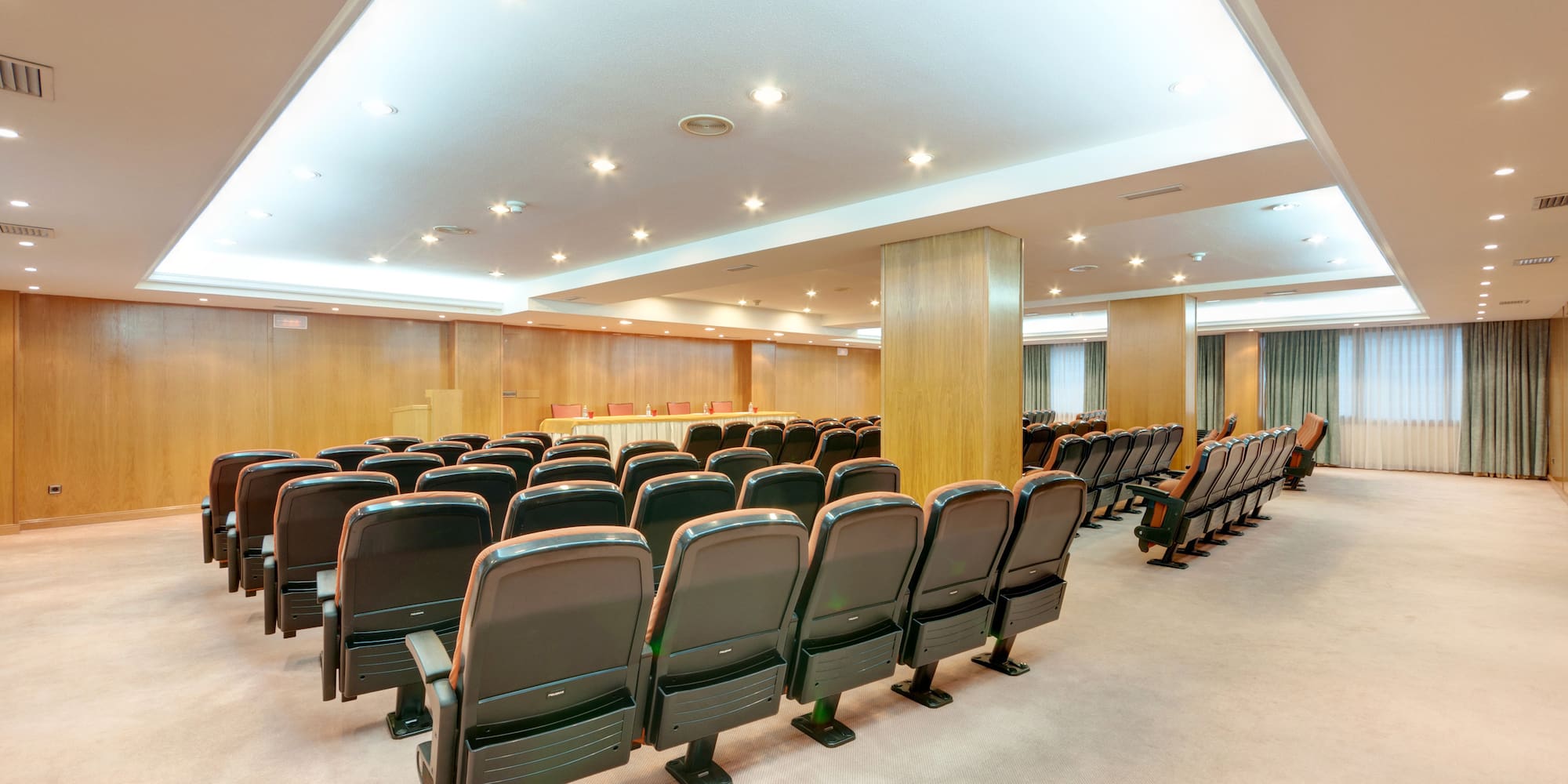 a room with rows of chairs