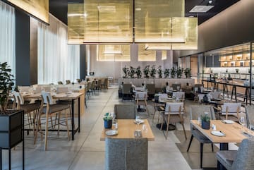 a large room with tables and chairs