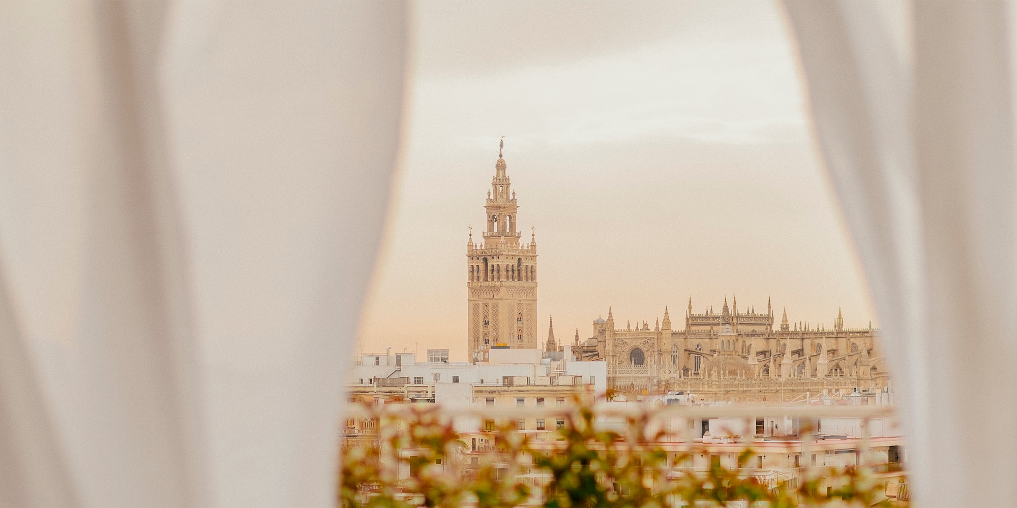 a tall building with a tower in the background