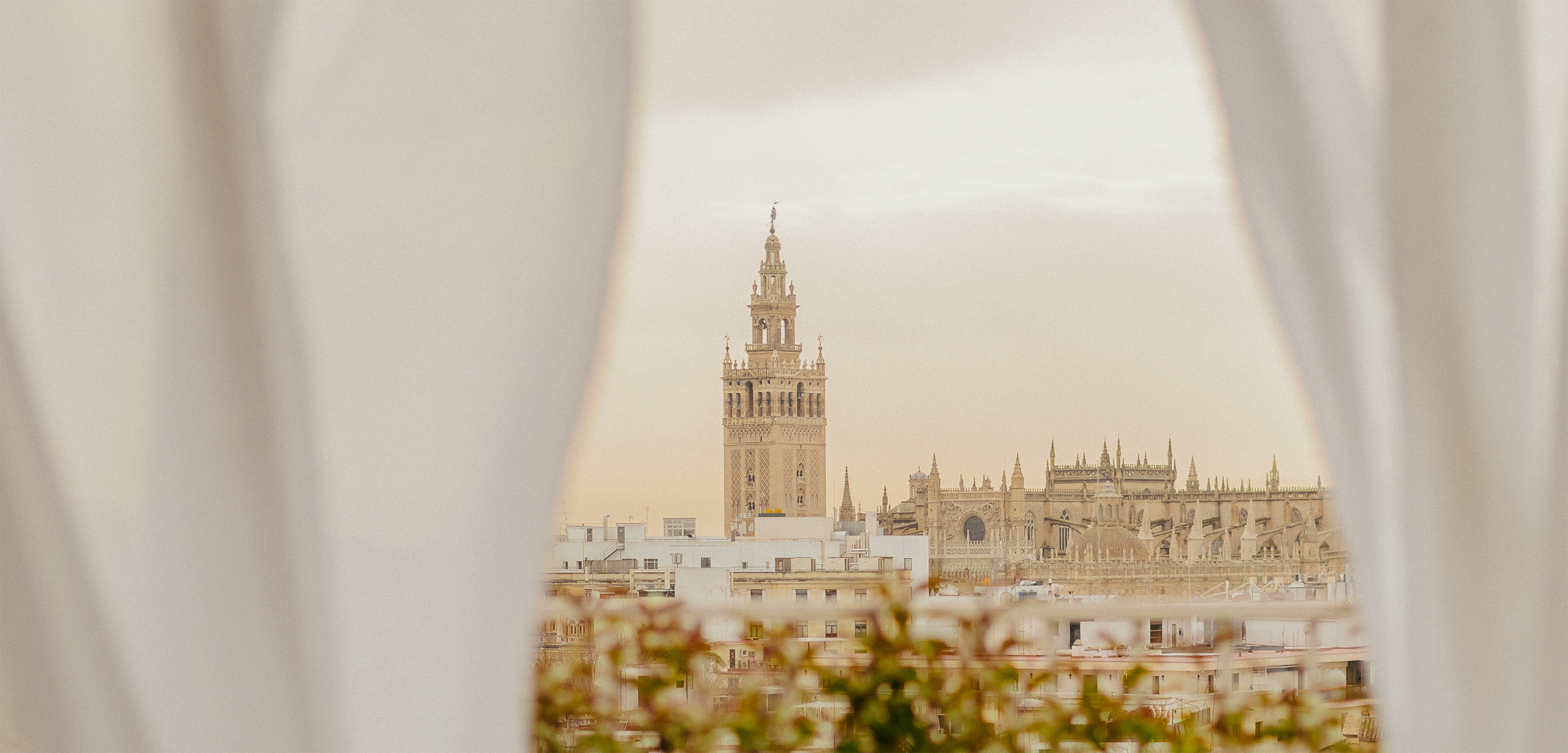 a tall building with a tower in the background