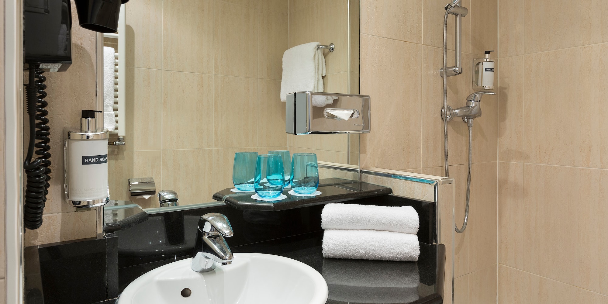 a bathroom with a sink and a shower