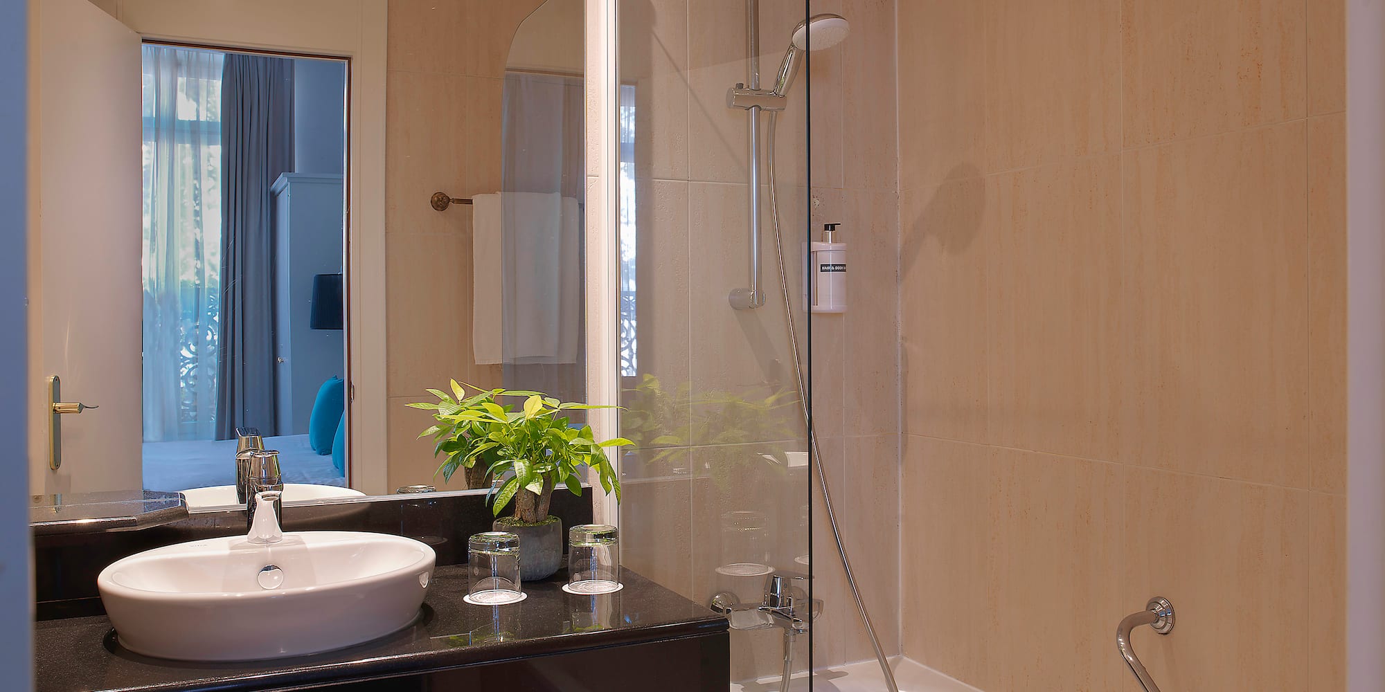 a bathroom with a sink and a shower