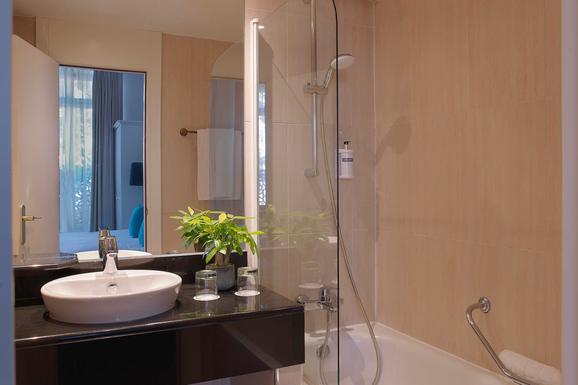 a bathroom with a sink and a shower