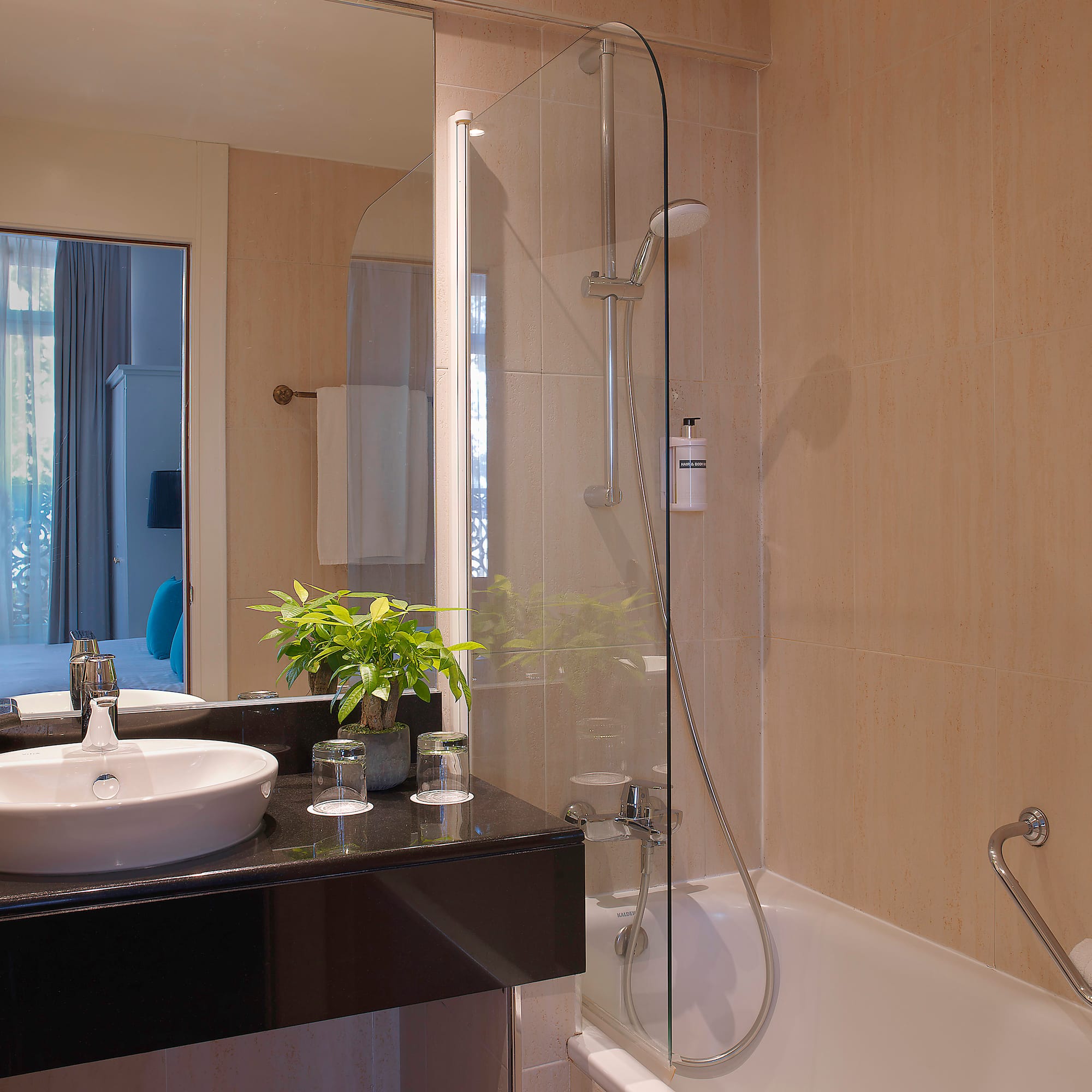 a bathroom with a sink and a shower