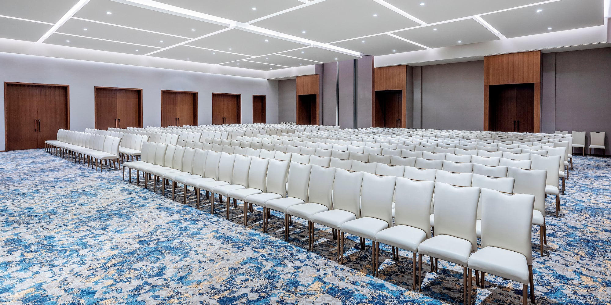 a large room with rows of chairs