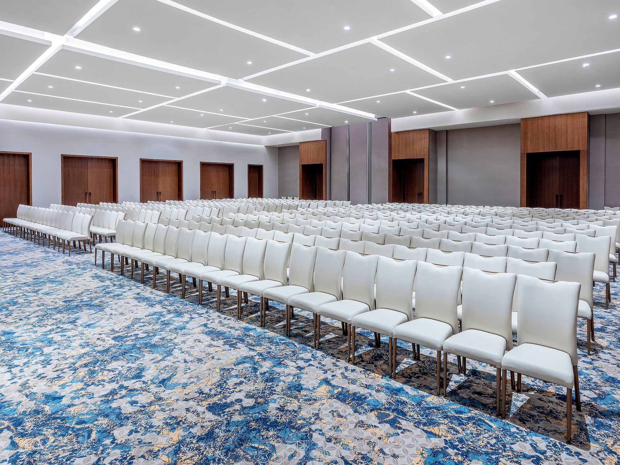 a large room with rows of chairs