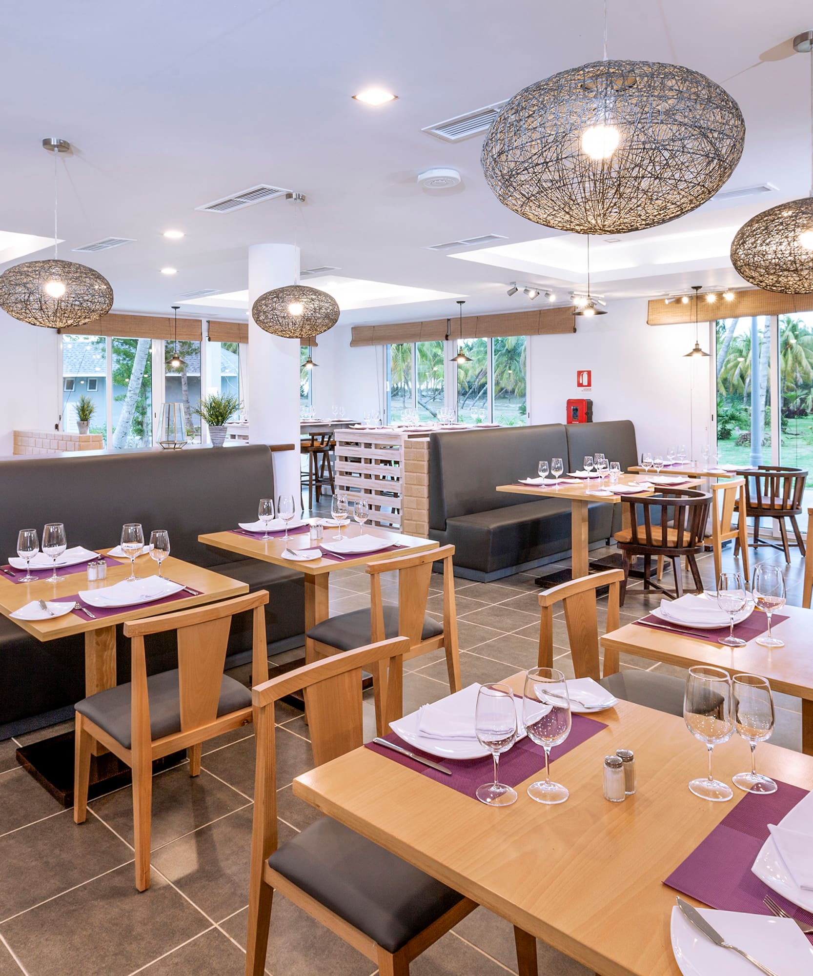 a restaurant with tables and chairs