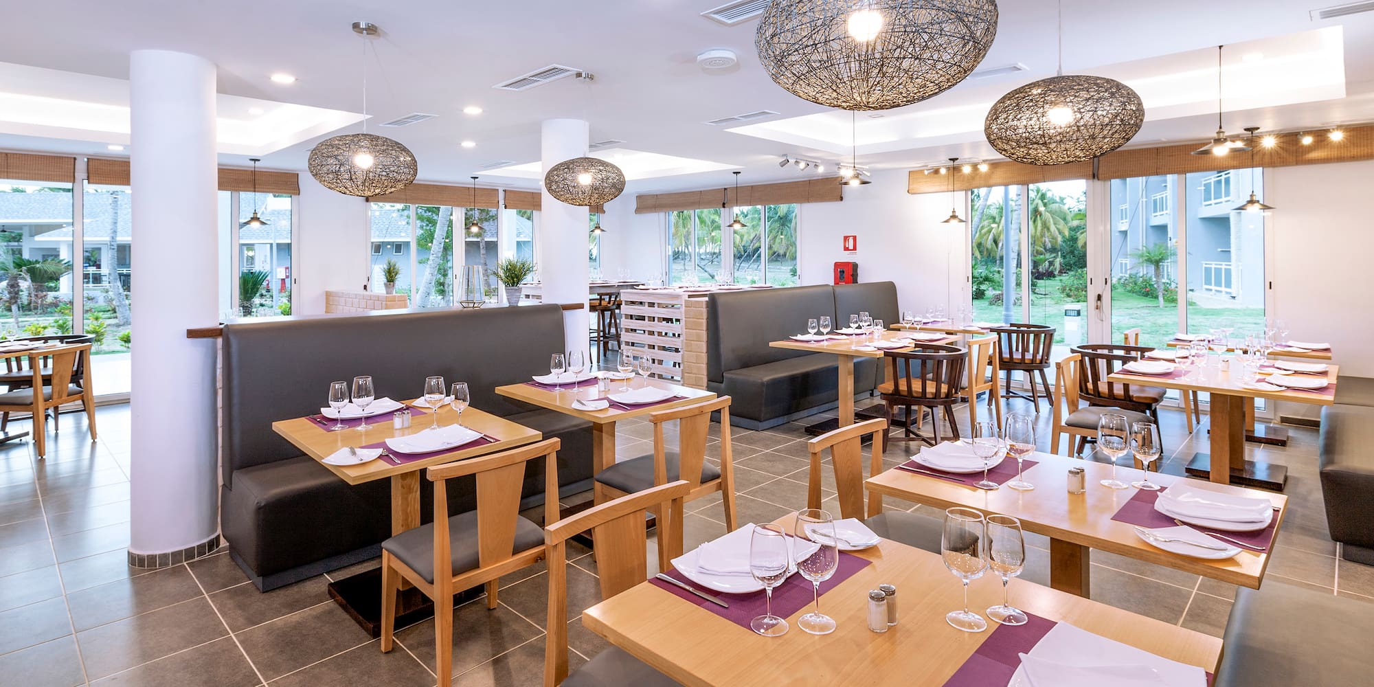 a restaurant with tables and chairs