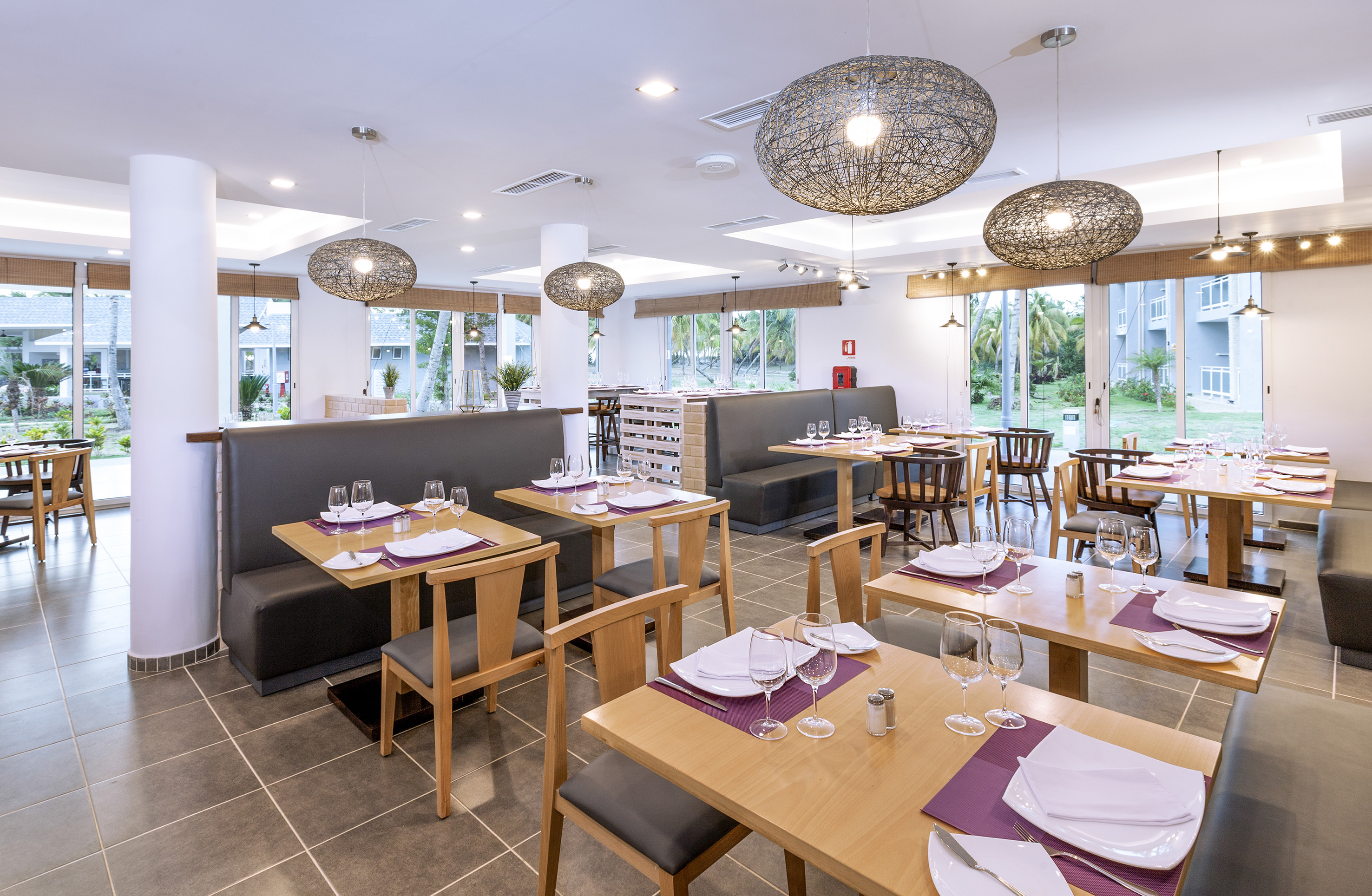 a restaurant with tables and chairs