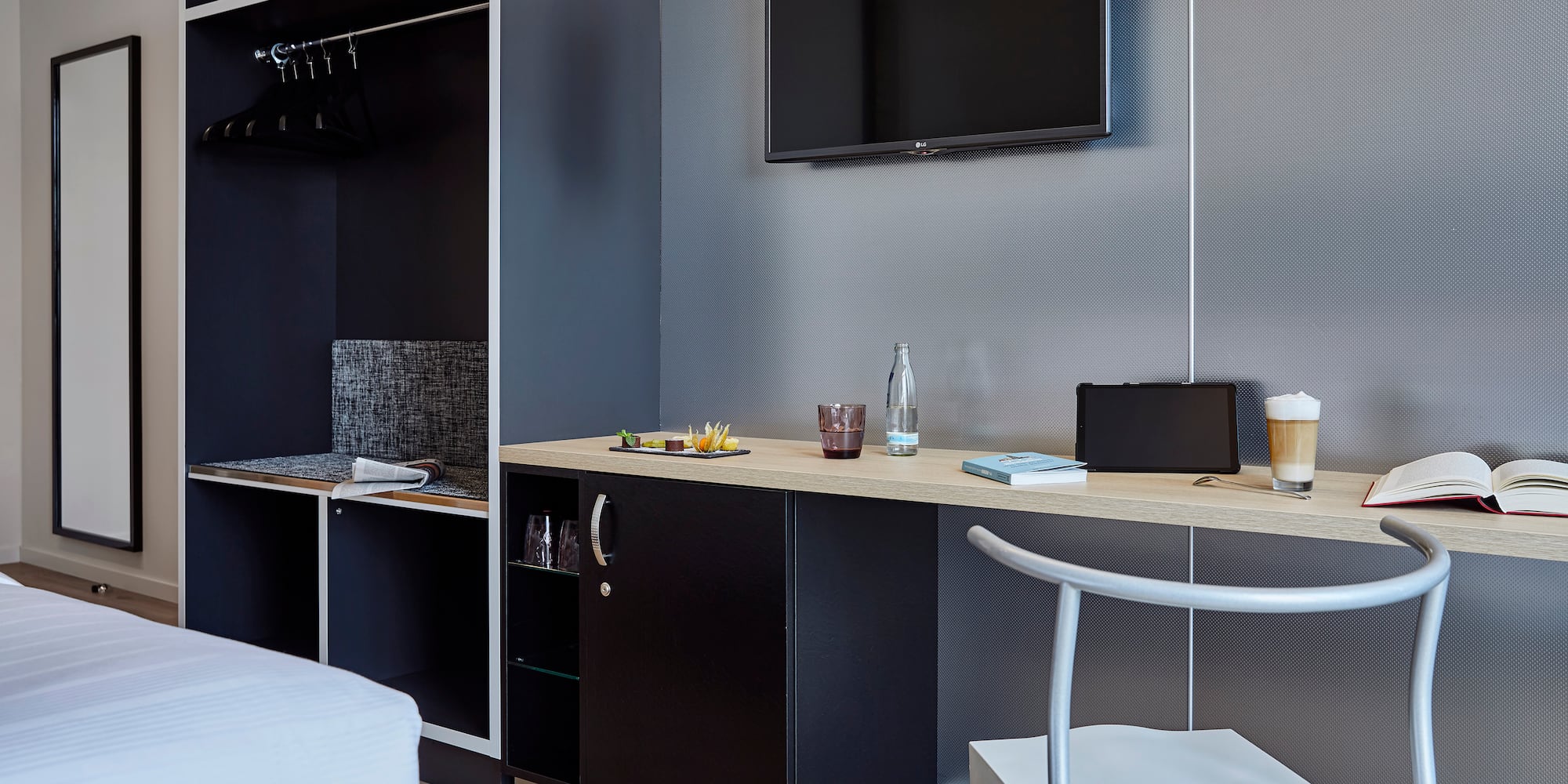 a room with a tv and a table