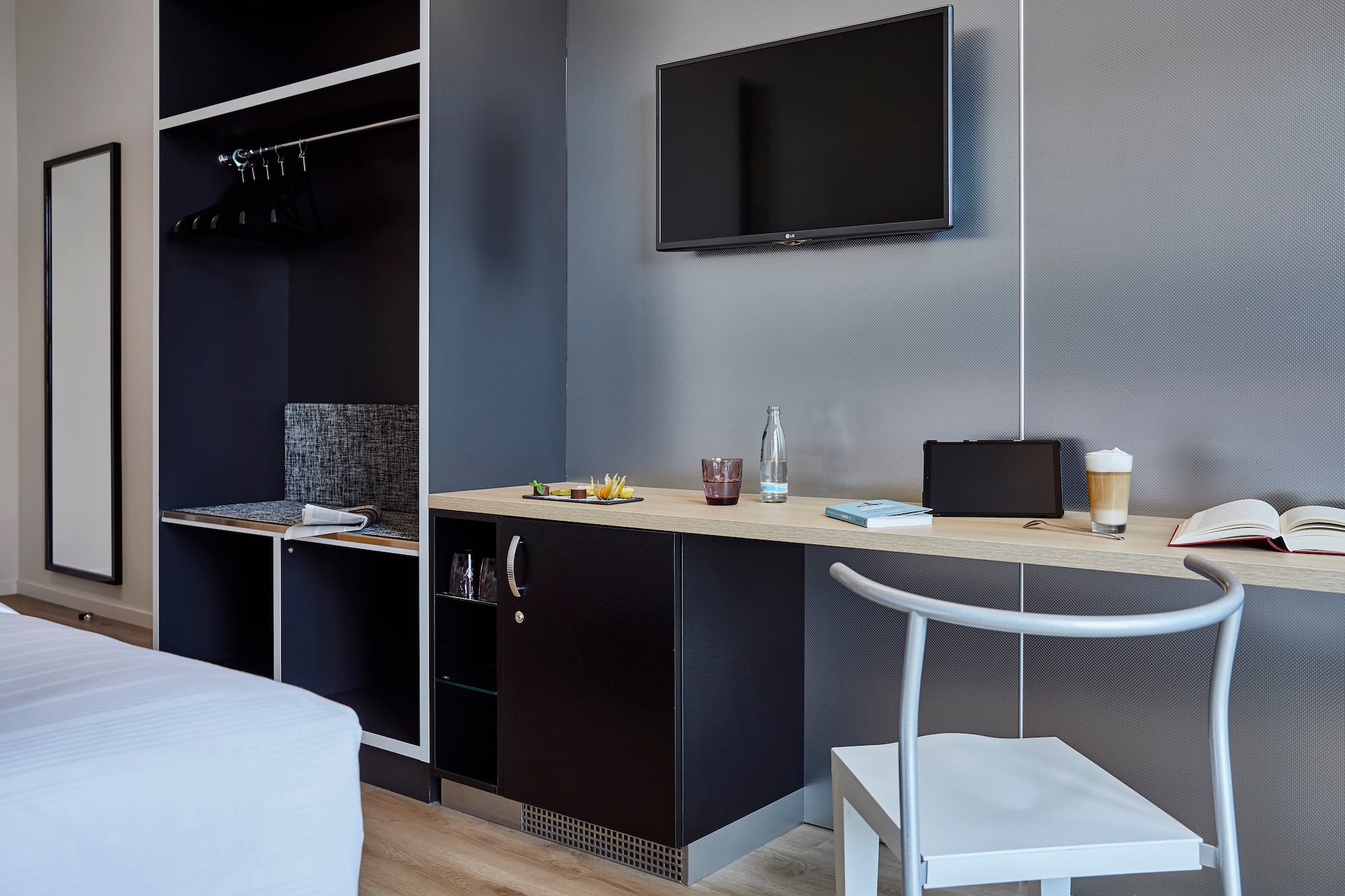 a room with a tv and a table