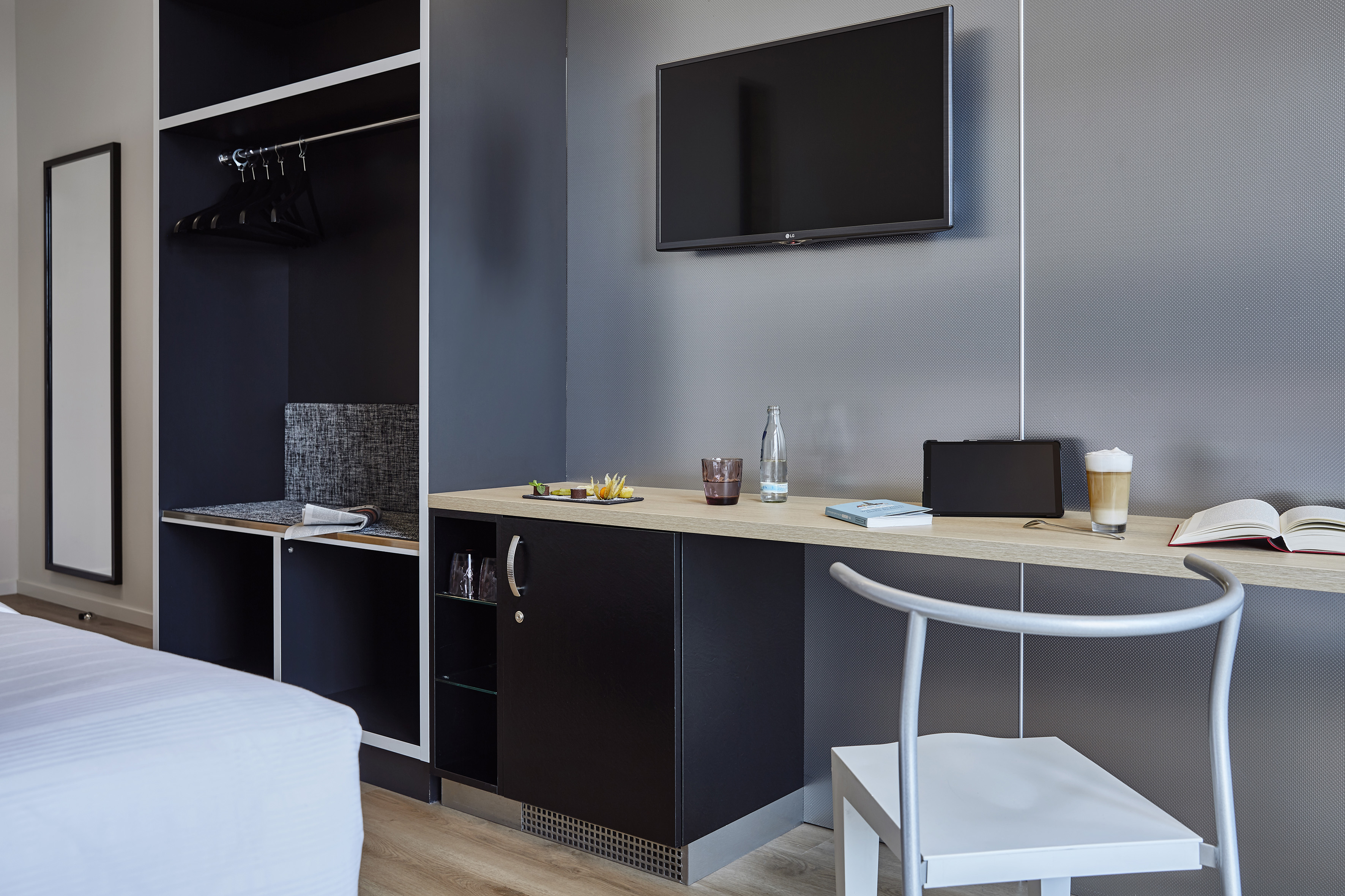 a room with a tv and a table