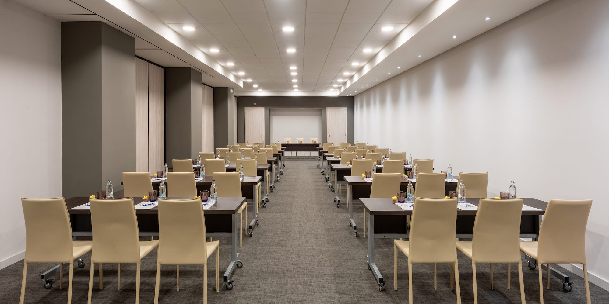a room with tables and chairs
