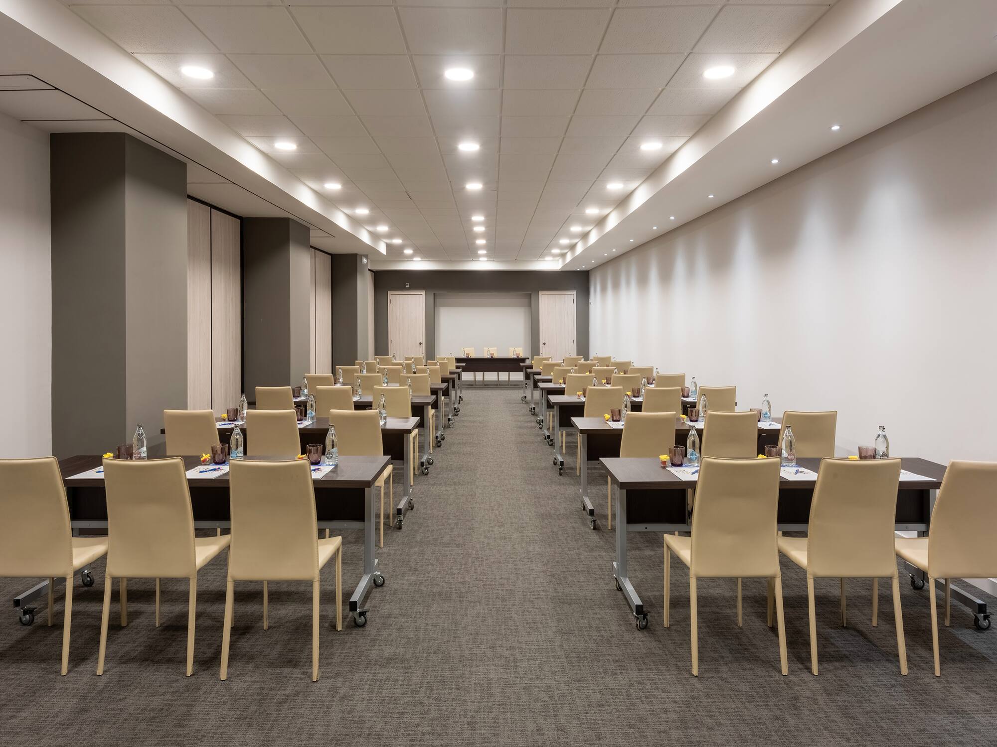 a room with tables and chairs