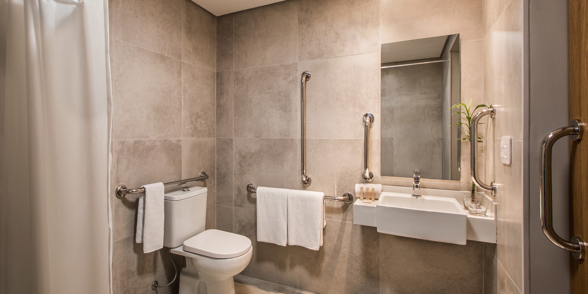 a bathroom with a sink and toilet