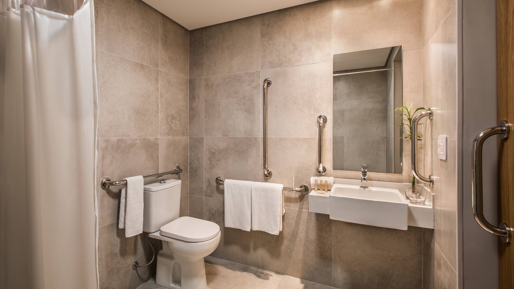 a bathroom with a sink and toilet