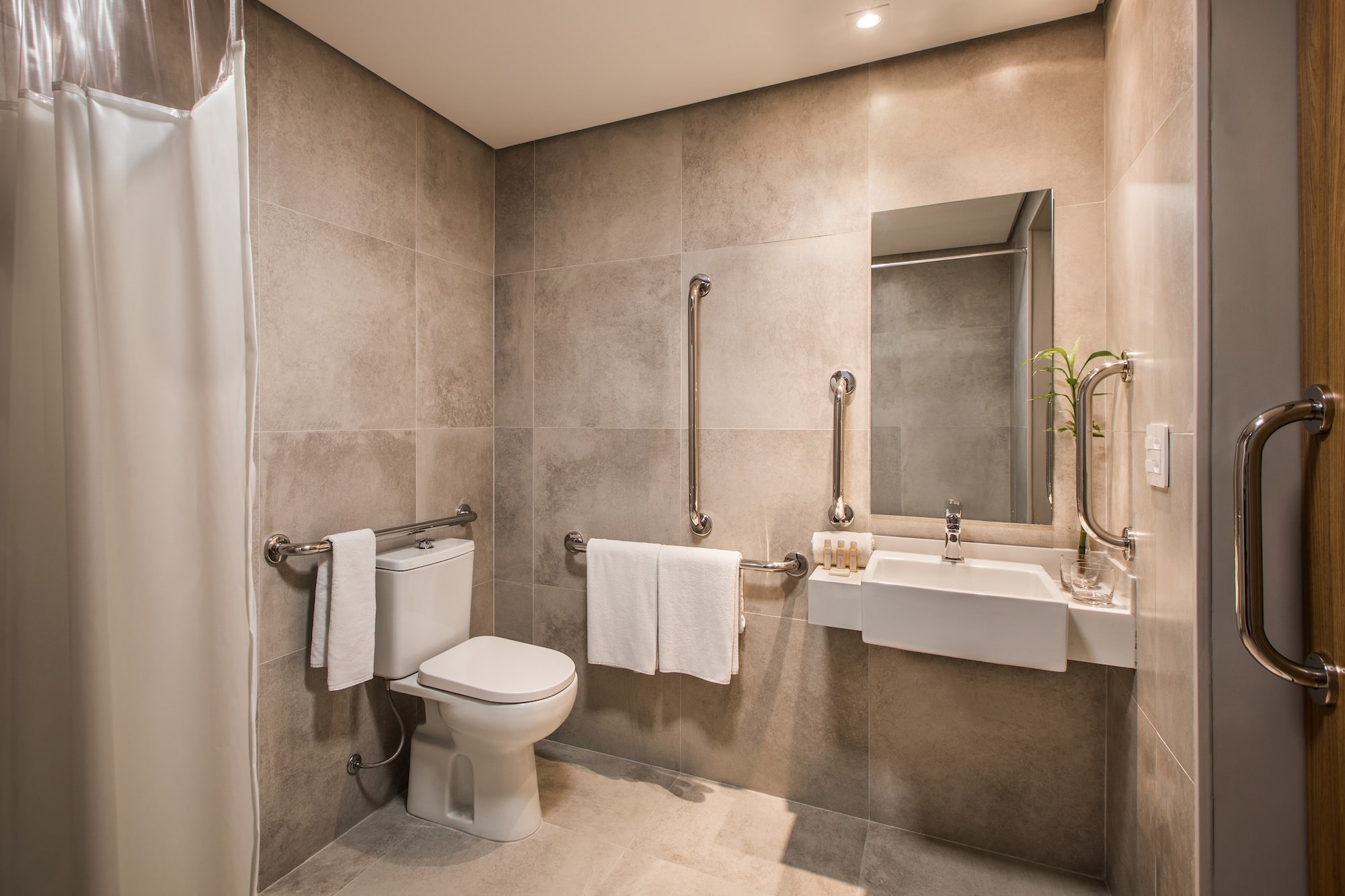 a bathroom with a sink and toilet