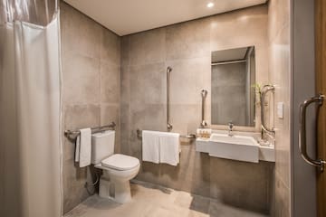 a bathroom with a sink and toilet